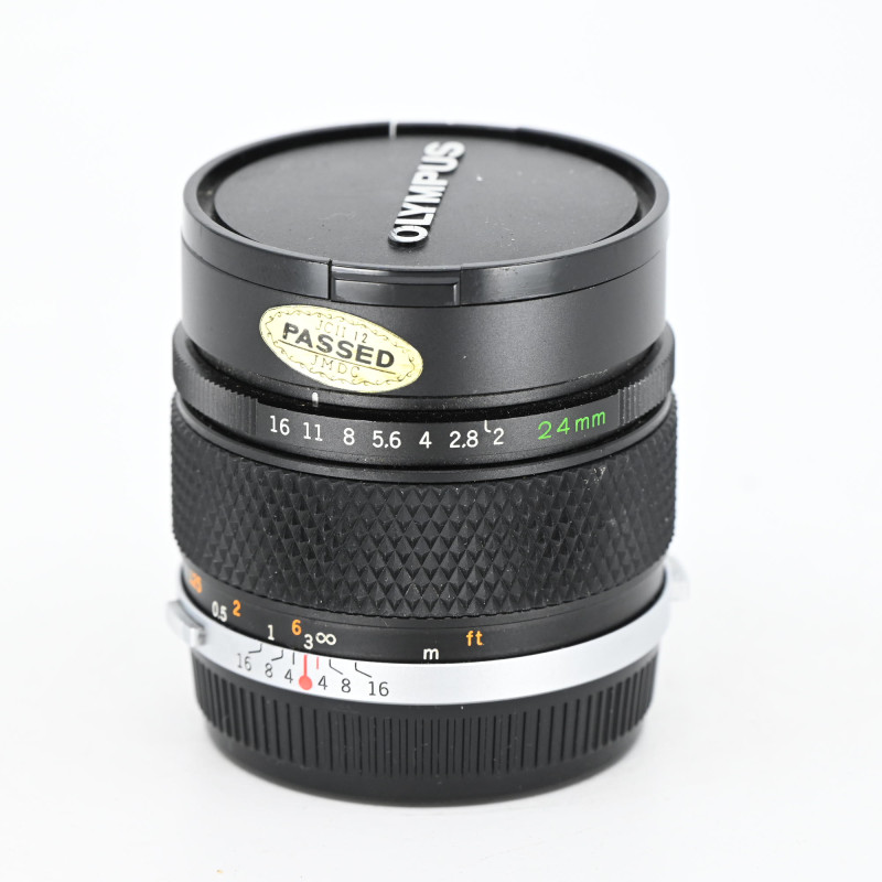 Olympus OM Zuiko Auto-W 24mm f/2 d'Occasion Bon État Garantie 12 Mois